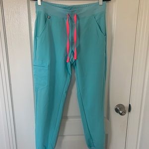 Used neon blue Figs, Zamora, jogger scrub pants.